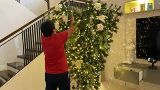 Decorating the upside down Christmas tree