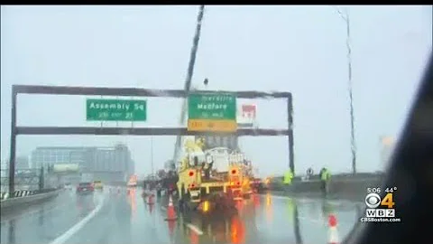 Highway sign falls onto I-93 in Somerville, hits d...
