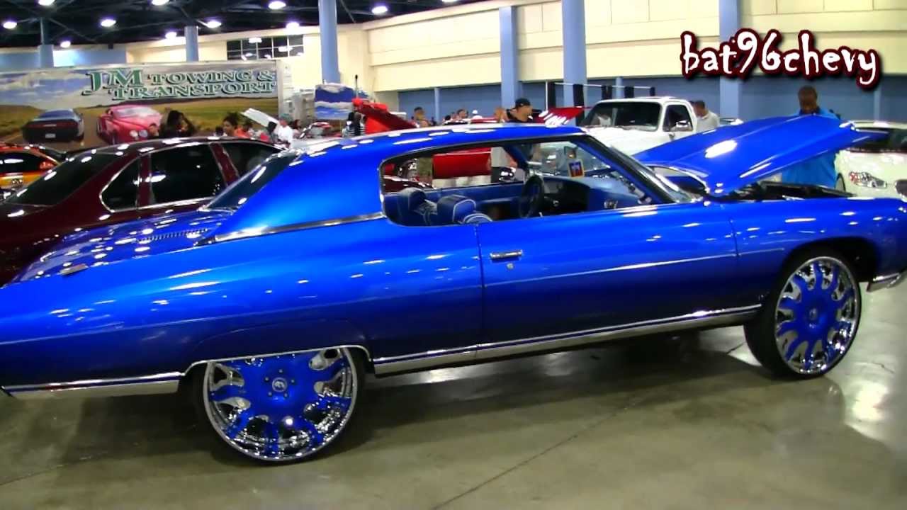 Candy Blue 1971 Chevrolet Caprice Donk sitting on some chrome/painted stagg...