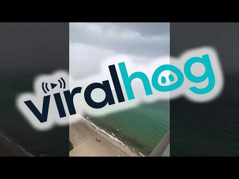 Impressive Tornado Forms Off the Coast || ViralHog