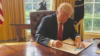 Trump Signs Revised Immigration & Travel Ban