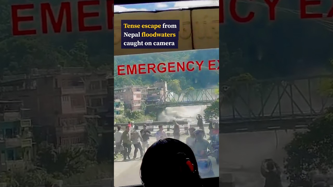 Bus passenger in Nepal films the moment floods surge into village