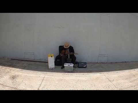 GASTONIA NC BLIND MAN PLAYING GUITAR 