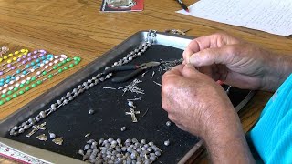 La Crescent man carries on rosary making tradition