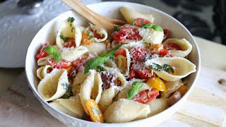 Pasta shells salad with Tomatoes olive oil dressing