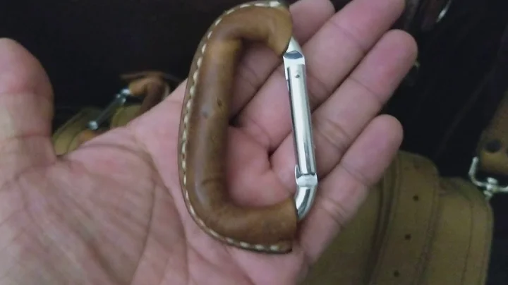 Custom leather wrapped carabiners by Mike Bookhardt.