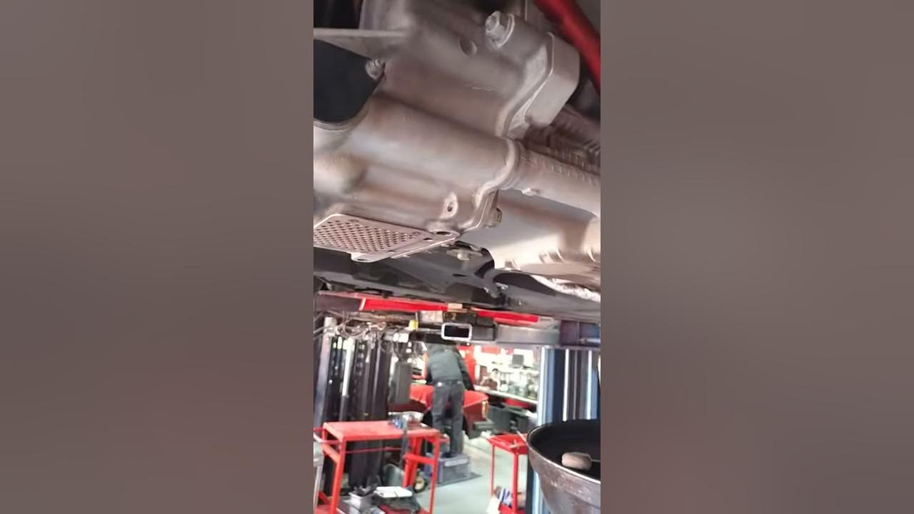 Ferrari 360 and 360 challenge stradale oil drain plug location on