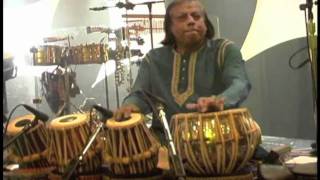 Here is something unique, indian tablas player badal roy and
puerto-rican percussionist frank colon, warming up their instruments
before the show at jazz...