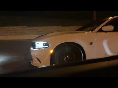 Corvette stingray vs charger hellcat