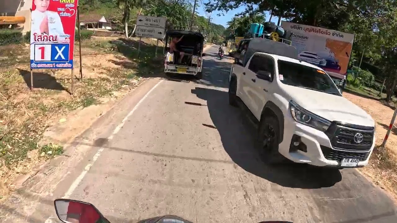 Riding Scooter on Koh Chang, Thailand