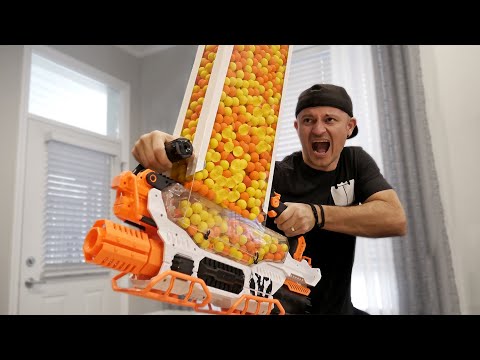 Bella and Jason go shopping for Nerf blasters at ToysRUs. Jason buys the Mega Mastodon and unboxes. 