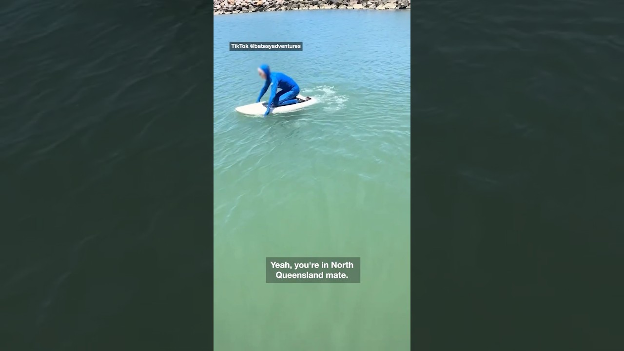 Disbelief as man paddles in crocodile infested waters despite surrounding warning signs