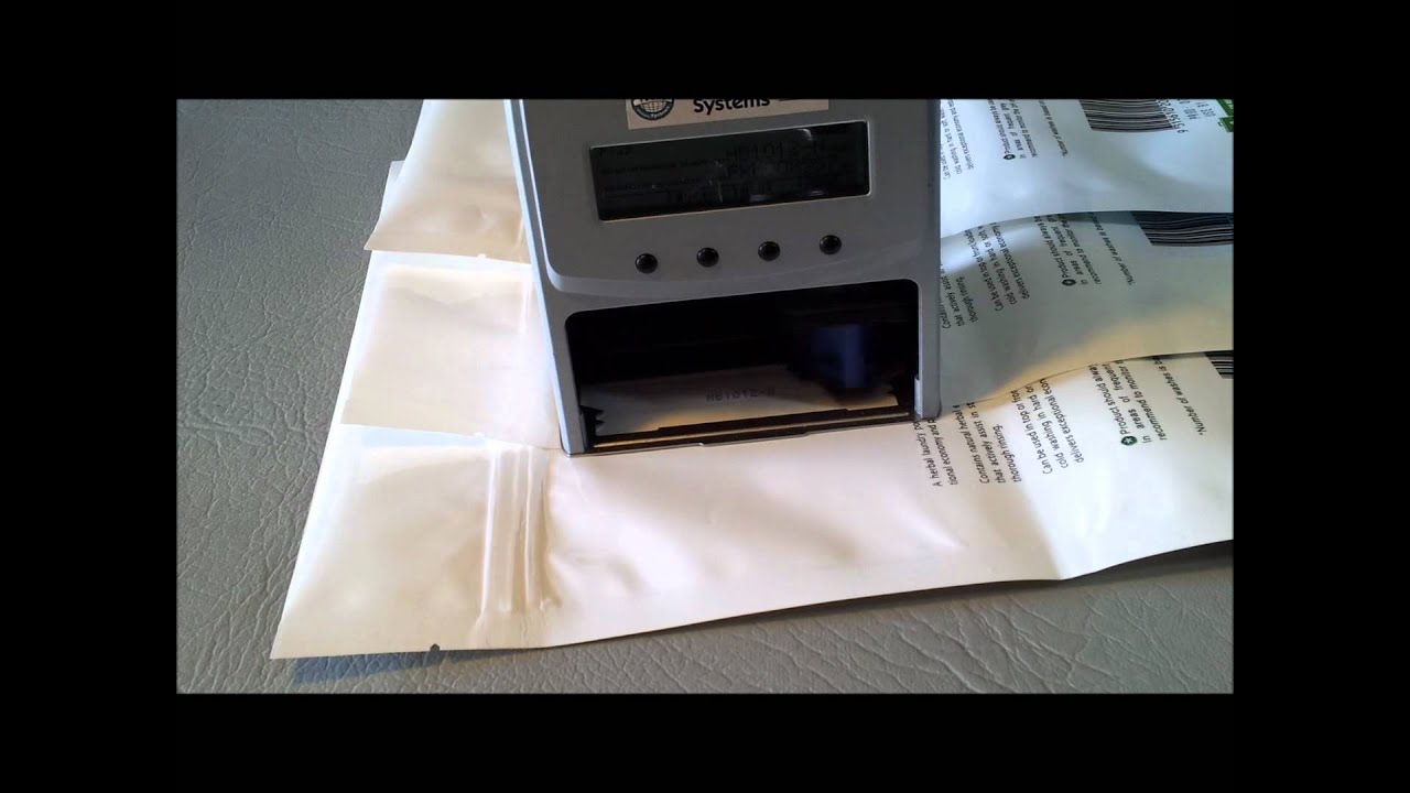 Portable Inkjet Printer - marking flat plastic bags with 2-line code - YouTube