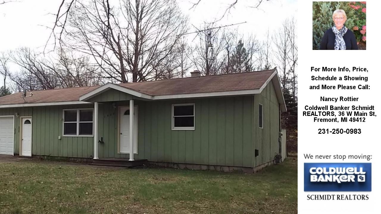 1502 Pine Hill, White Cloud, MI Presented by Nancy Rottier.