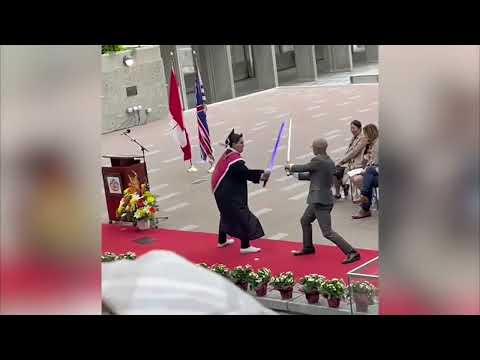 Student Sneaks Lightsabers Into Graduation to Challenge Principal