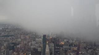 View from the empire state building as rain slowly approaches over
downtown manhattan. (july 2017)