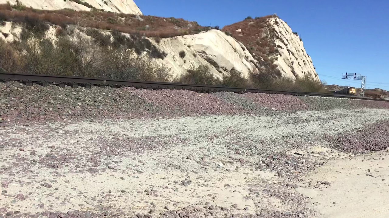 UP 8988 Leads Sothound AutoRack train Passes Through Cajon Pass CA