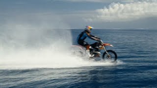 Motocross star surfs big waves on his bike screenshot 5