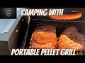 Portable pellet grill while camping in the woods