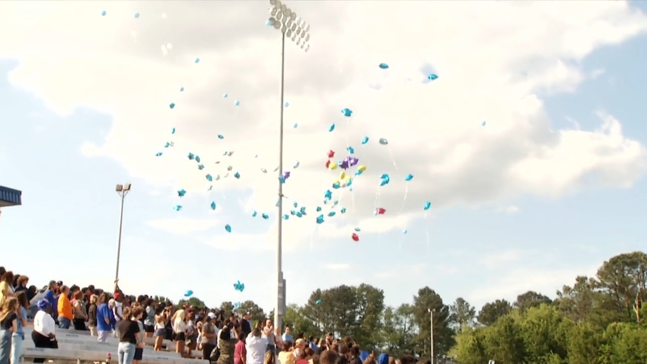 Community holds vigil in honor of two Cleveland High School students ...