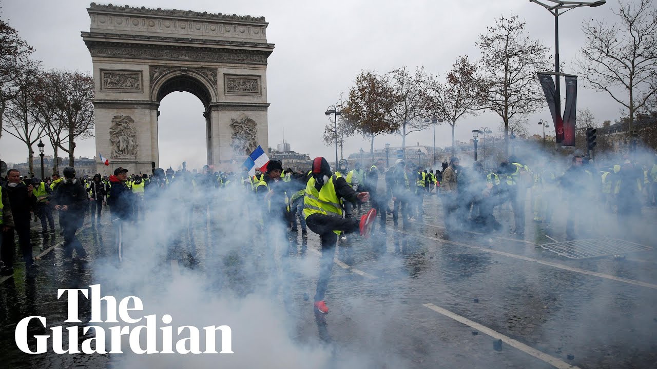 Police And Protesters Clash In Paris Video