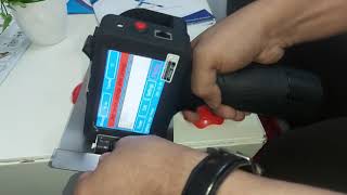 Details handheld Priner for batch coding on plastic item pouches labels ice cream caps Guide