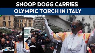 Snoop Dogg Takes Part In Olympic Torch Relay As Milano-Cortina Opening Nears