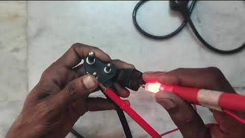 laptop charger cord checking using continuity tester