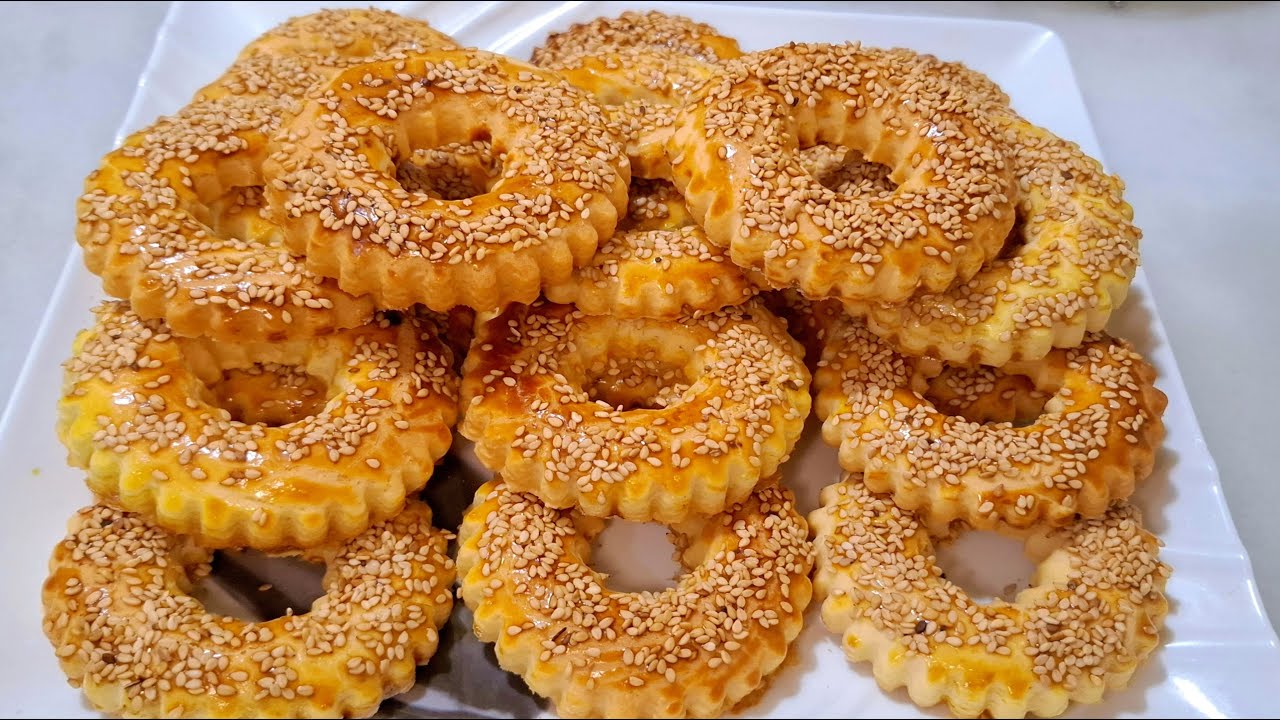 حلوى طابع الاقتصادية👌حلوى سهلة و سريعة ،بكأس زيت تحضري كمية كبيرة 55 حبة و شكل يهبل و بنينة و هشة