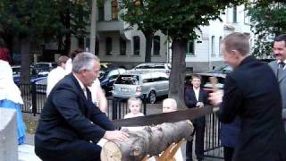Traditional Cutting of the Wood at a German Wedding Traditional Cutting of the Wood at a German Wedding