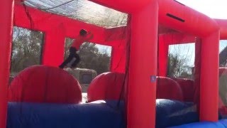 Inflatable wipeout game, Pearland, Texas party rentals, Hopper Moonwalks 281-455-6372