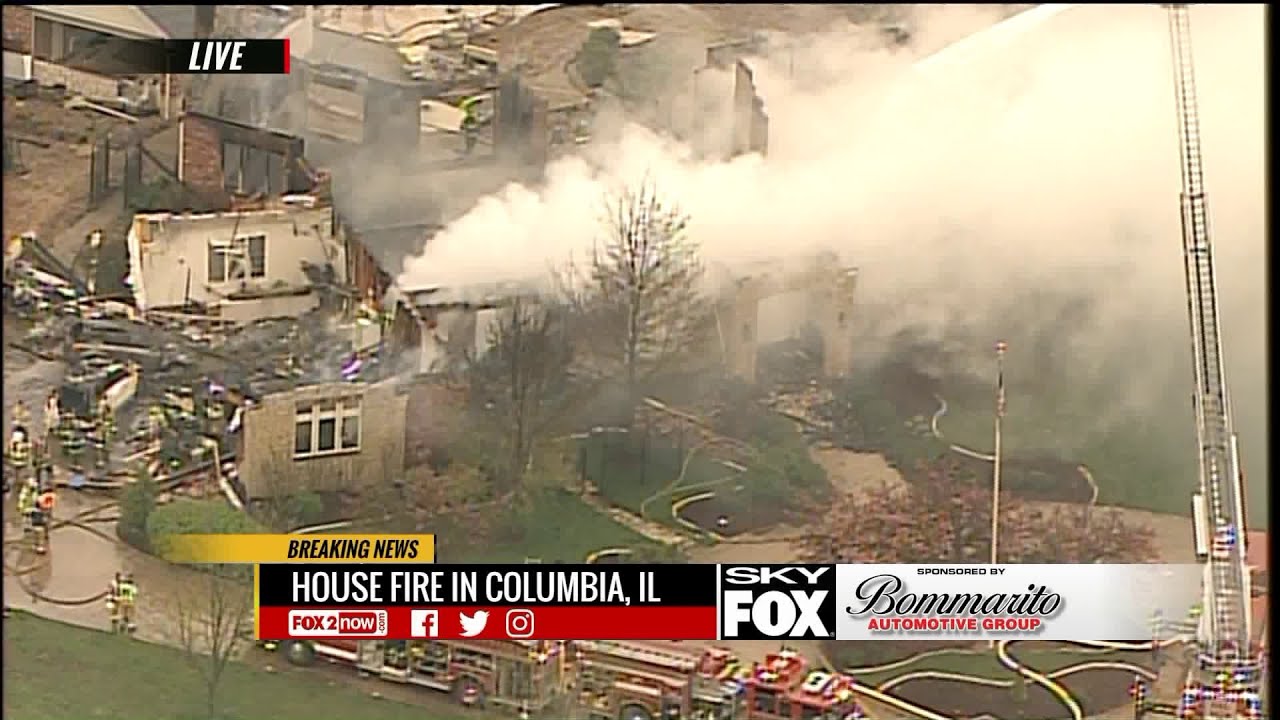 Fire crews battle massive house fire in Columbia, Illinois YouTube