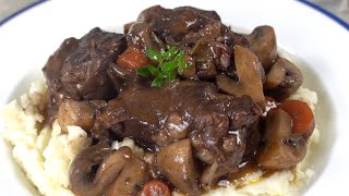 Tender Braised Beef in Red Wine with fresh sautéed mushrooms in this hearty delicious meal.