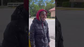 6ix9ine At synergy covers himself with a red hoodie while pumps gas into his yellow McLaren 🤯