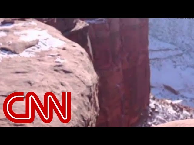 Guy pushes his girlfriend off a cliff