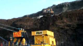 Dozer Pushing Tar Sand Off Cliff, Sketchy.AVI