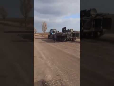 This Ukraine Farmer Decided He Takes A Russian Tank With His Tractor...