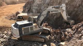 Liebherr 984 Excavator Loading Caterpillar Dumpers - Kivos Ate