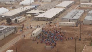 Aerial footage shows immigrant families protest inside Texas detention facility