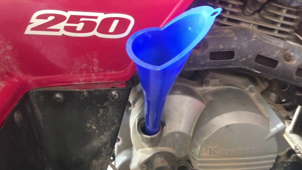 How to change the oil on kawasaki bayou 250 and doing crazy donuts