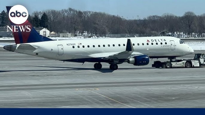 Delta Planes Clip Wings On Minnesota Tarmac