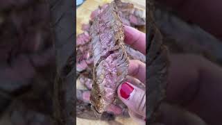 Cooking a steak outdoors