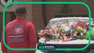 Deptford community visits growing memorial to remember officer Bobby Shisler