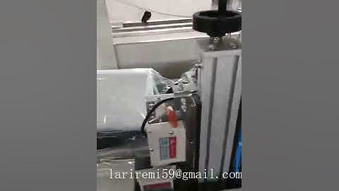 Automatic labeling maxi roll single shrink packing machine with heat shrink tunnel