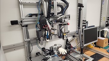 An 8 axis multi-material 3D printing system