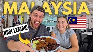 FIRST TIME TRYING NASI LEMAK IN KUALA LUMPUR! 🇲🇾 The National Dish of Malaysia AMAZED us!!