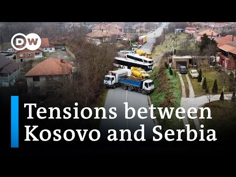 Serbs in northern Kosovo start removing roadblocks | DW News