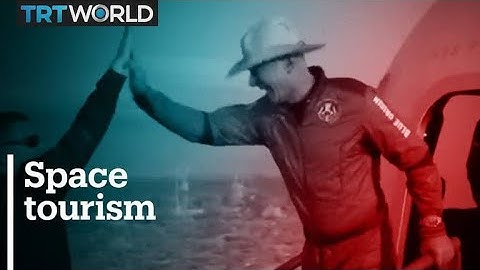 Jeff Bezos completes pioneering flight to edge of space