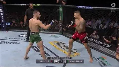 Dustin Poirier points at Conor McGregor's leg after HARD kick