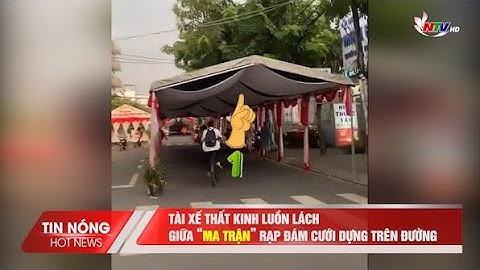 Tài xế thất kinh luồn lách giữa “ma trận” rạp đám cưới dựng trên đường